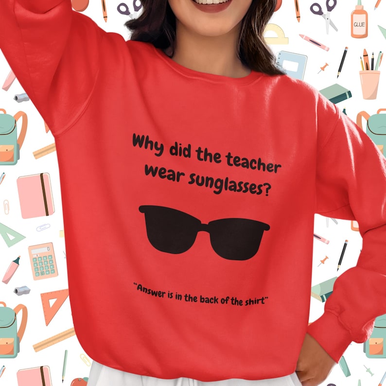Funny Teacher Sweatshirt, "Bright Students" Graphic Pullover, Unisex Cozy Apparel with Quote: Why did the teacher wear sunglasses? a black sunglasses is designed in the apparel. *Answer is in the back of the shirt - Because her students sere so bright! Female model wearing team red color sweatshirt.