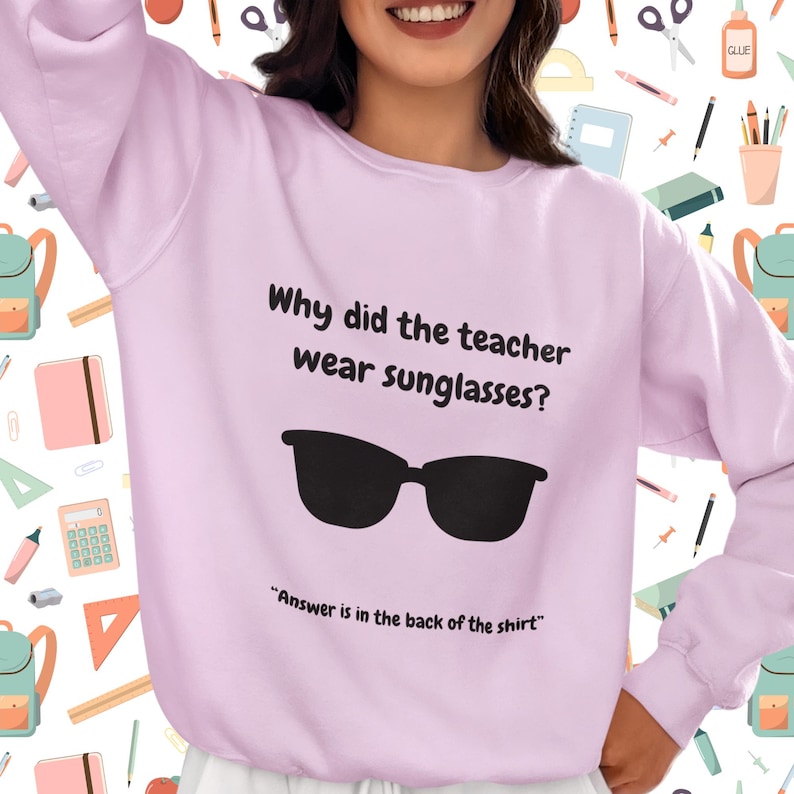 Funny Teacher Sweatshirt, "Bright Students" Graphic Pullover, Unisex Cozy Apparel with Quote: Why did the teacher wear sunglasses? a black sunglasses is designed in the apparel. *Answer is in the back of the shirt - Because her students sere so bright! Female model wearing lavender color sweatshirt.