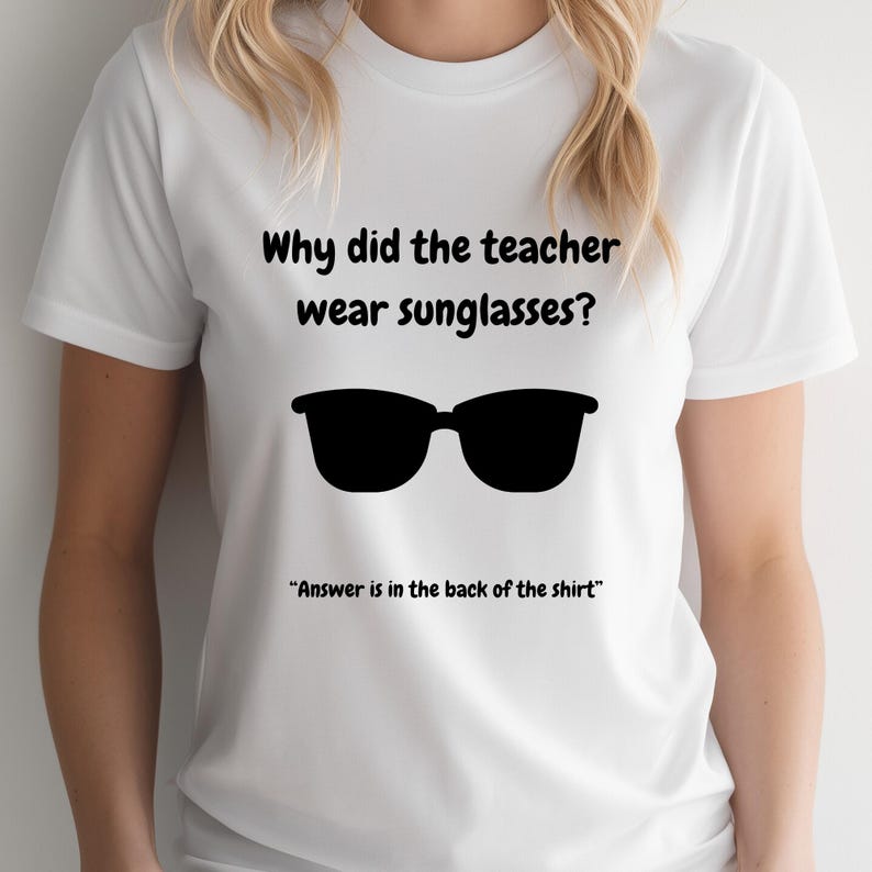 Funny Teacher T-Shirt, "Bright Students" Graphic Tee, Unisex Shirt with Quote: Why did the teacher wear sunglasses? a black sunglasses is designed in the apparel. *Answer is in the back of the shirt - Because her students sere so bright! Female model wearing white color t-shirt.