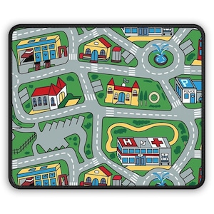 May include: A colorful play mat with a city theme. The mat features a variety of buildings, including a police station, a hospital, a school, and a fire station. There are also roads, trees, and a fountain.