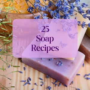May include: Image of handmade soap bars in purple, beige, and brown, adorned with lavender. The image includes the text "25 Soap Recipes" on a pink background. The scene suggests a guide or tutorial for making soap.