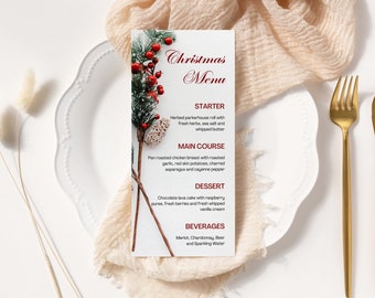 May include: A Christmas menu with a red and white design. The menu includes a starter, main course, dessert, and beverages. The menu is decorated with a sprig of holly.