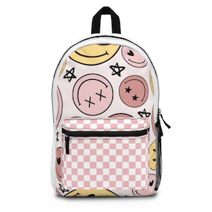 Sac à dos Smiley à damier rose pastel avec étoiles et yeux X | Joli sac d'école à carreaux avec étoile | Léger et résistant | Pochette pour ordinateur portable
