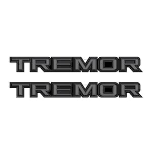 May include: Two black and grey "Tremor" decals. The decals have a raised, 3D effect.