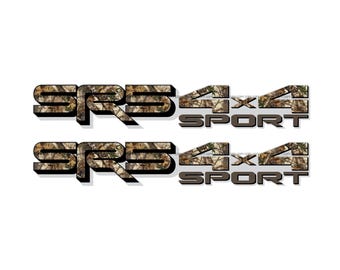 May include: Two sets of decals with the text "SRS 4x4 SPORT". The letters and numbers have a camouflage pattern in brown, tan, and green. The text has a 3D effect with a shadow.