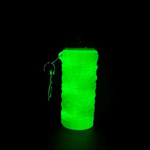 May include: A green glow-in-the-dark bottle with a key chain attached. The bottle is made of a textured material and has a round shape.