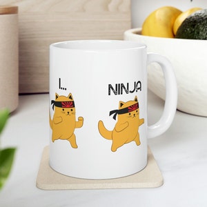 Funny Orange Cat Mug 11oz and 15oz Ninja Cat Mugs Orange Cat Gift Orange Tabby Cat Mug Cat Gift Funny Cat Coffee Mug with Cat Mom Sweat