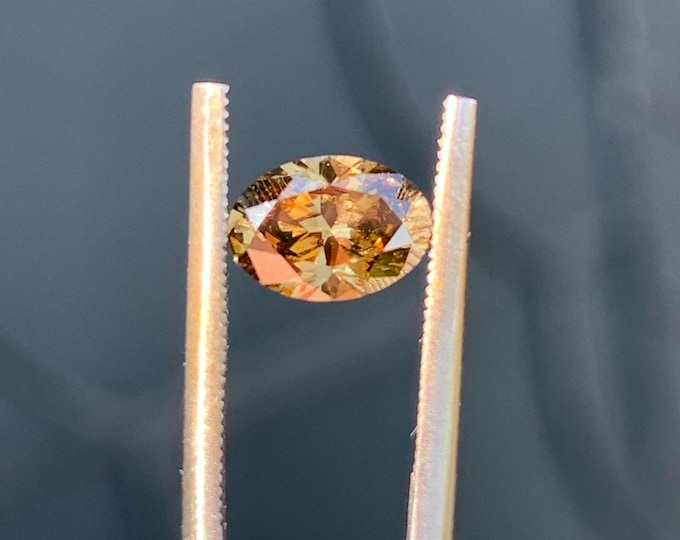 IGI 0.63 ct fancy diamond natural| II1 IGI certificate - natural fancy Diamond Oval Brilliant cut diamond report