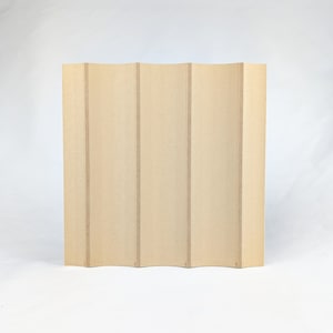 May include: A light brown folding screen with a wavy design. The screen is made of wood and has a natural finish.