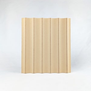 May include: A beige, textured wall panel with a wavy, vertical pattern.