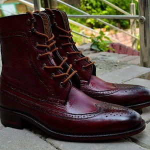 Red wingtip best sale boots