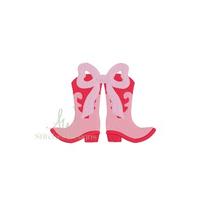 May include: Pink cowboy boots with a pink bow on top. The boots are embroidered with a floral design.