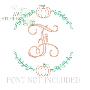 May include: A monogram embroidery design featuring the letter "F" in a cursive font, surrounded by a wreath of green leaves and two orange pumpkins.