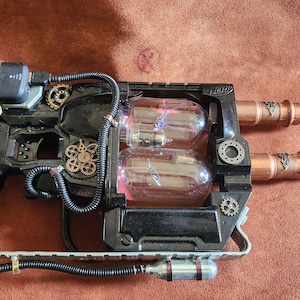 Nerf gun converted to non-firing steampunk prop weapon.