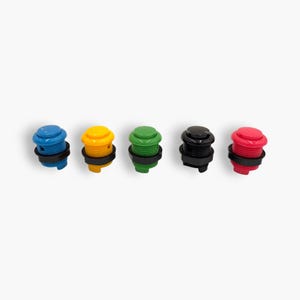May include: Five colorful arcade buttons in blue, yellow, green, black, and red. Each button has a round, raised top and a black ring around the base. The buttons are arranged in a row against a white background.