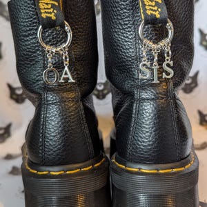 Charms de plata para botas supersónicas