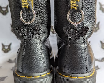 Zwarte laarsbedels met schedelmotten