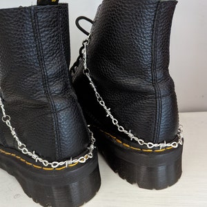 Handmade barbed wire boot chains