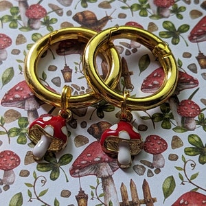 Red and gold mushroom boot charms