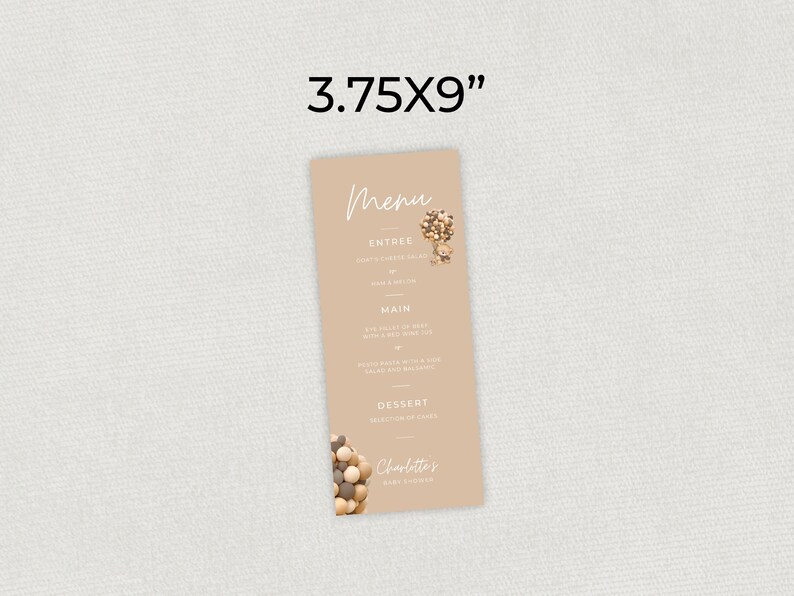 Pu&ograve; includere: Un menu marrone con la parola "Menu" in corsivo bianco. Il menu elenca "Entree", "Main" e "Dessert" con le descrizioni di ciascuno. La carta misura 3,75 x 9 pollici e presenta una piccola illustrazione di una mongolfiera fatta di perline di legno.
