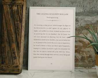 May include: A black and white print of a page from "The Legend of Sleepy Hollow" by Washington Irving. The text describes a headless horseman riding on a horse.