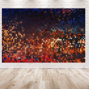 May include: A wall art piece featuring a mosaic of round, iridescent sequins in shades of blue, orange, red, and yellow. The sequins are arranged in a grid pattern, creating a shimmering effect.