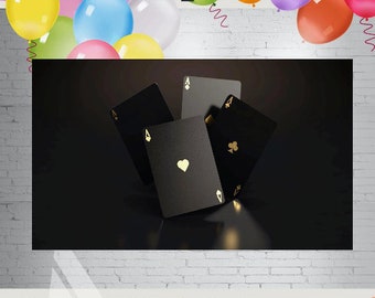May include: Four black playing cards with gold accents, including an ace of hearts, are arranged in a pile on a black surface. The cards are slightly tilted and appear to be floating.