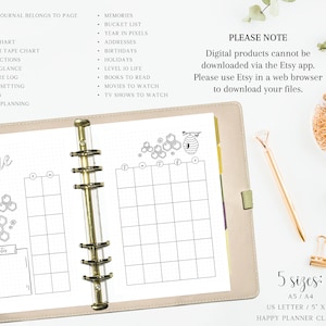 May include: A black and white printable planner page with a honeycomb and bee design. The page is labeled 'June' and has a section for notes. The page also has a section for daily entries. The text 'PLEASE NOTE' appears in the upper right corner of the page. The text below 'PLEASE NOTE' reads 'Digital products cannot be downloaded via the Etsy app. Please use Etsy in a web browser to download your files.' The text below '5 sizes' reads 'A5/A4 US LETTER/5' X 7' HAPPY PLANNER CLASSIC'.