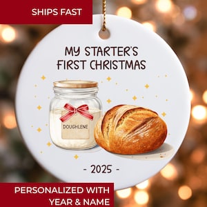 May include: White ceramic Christmas ornament with a bread-themed design. It features a jar of dough, a loaf of bread, and the text "MY STARTER'S FIRST CHRISTMAS - 2025". The ornament also includes the text "PERSONALIZED WITH YEAR & NAME".