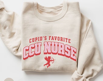 Valentines CCU Nurse Sweatshirt, Cupid Favorite CCU Nurse Crewneck, Critical Care Unit Nurse Pullover, CCU Nurse Crew Sweater, Varsity Style