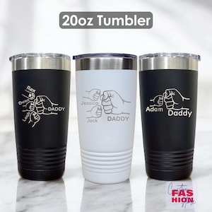 May include: Three 20oz tumblers with stainless steel lids. One black tumbler features a white graphic of three fists and the names Rex, Owen, and Leah. A white tumbler has a similar graphic with the names Jessica and Jack. The third black tumbler has the name Adam.