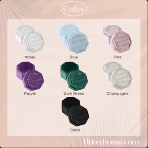 May include: A selection of octagonal ring boxes in various colors, including white, blue, pink, purple, dark green, champagne, and black. The boxes are made of a soft, velvety material and are displayed with the word "Color" at the top.