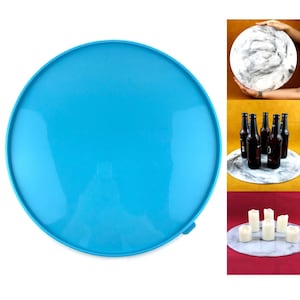 May include: A bright blue round serving tray made of plastic. The tray is perfect for serving snacks, drinks, or appetizers.