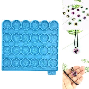 May include: Blue silicone mould with 24 circular impressions featuring different flower designs. Each impression has a corresponding flower name printed below. The mould is labelled with the number 7699. A close-up of a necklace with a pendant made from the mould is also shown.