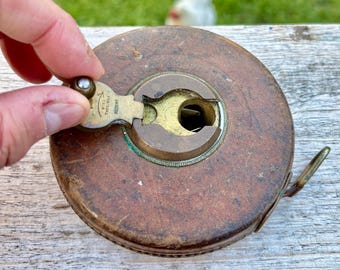 Antique Rabone Leather Tape Measure c.1890s–1930s, English Steel Tape with Solid Brass Winder, Heavy Tool Collector’s Piece