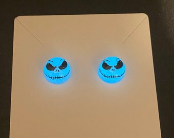 Glow in the dark halloween stud earrings.