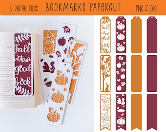 May include: Bookmarks papercut designs in fall themes. The image shows several bookmarks with cut-out designs of pumpkins, leaves, and the text "Fall into a good book." The bookmarks are in shades of orange, white, and burgundy.