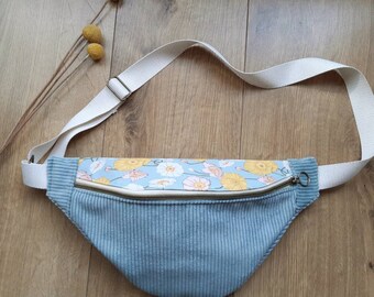 grey-blue velvet and yellow faux flower fanny pack
