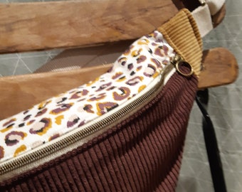 Plum corduroy fanny pack, matching leopard print flap and mustard yellow sides.
