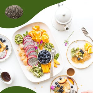 May include: A white background with a green border. The text "11 AMAZING COOKING RECIPES WITH CHIA SEEDS" is at the top of the image. There is a bowl of chia seeds, a teapot, a plate of fruit, a plate of pancakes with fruit and blueberries, and a cup of coffee. The text "By-Minha Vaseem" is at the bottom of the image.