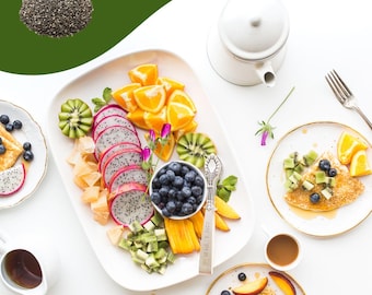 May include: A white background with a green border. The text "11 AMAZING COOKING RECIPES WITH CHIA SEEDS" is at the top of the image. There is a bowl of chia seeds, a teapot, a plate of fruit, a plate of pancakes with fruit and blueberries, and a cup of coffee. The text "By-Minha Vaseem" is at the bottom of the image.