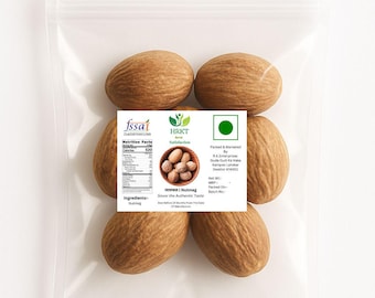 May include: A clear plastic bag containing six whole nutmegs. A white label displays nutrition facts, the HRKT logo, and text that reads "Nutmeg, Savor the Authentic Taste". The nutmegs are brown and have a textured surface.