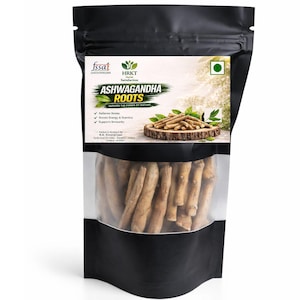 May include: A black pouch with a clear window displaying ashwagandha roots. The label reads "ASHWAGANDHA ROOTS" with text indicating benefits. The roots are light brown, and the packaging is sealed.