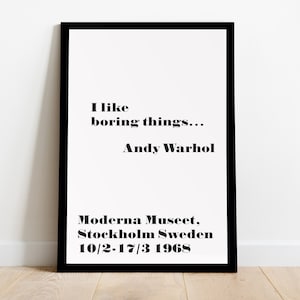 May include: A framed art print with the quote "I like boring things..." by Andy Warhol. The print also includes the Moderna Museet, Stockholm Sweden, and the dates 10/2-17/3 1968.