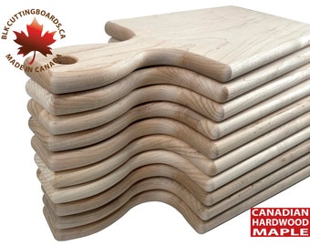 10 Paddle Cutting Boards, crafted from premium Canadian hardwood maple, available at wholesale price. Ideal for resin and epoxy art projects