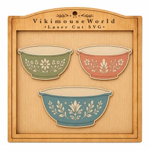 May include: A wooden display board featuring the text Vikimouse World Laser Cut SVG at the top. Three wooden bowl cutouts are mounted on the board, each decorated with floral patterns in muted green, coral, and blue colours with cream accents.