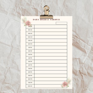 May include: A printable daily holiday schedule planner with a blank space for the date. The planner has a floral design with pink and white flowers and green leaves. The planner is divided into hourly time slots from 7:00 AM to 12:00 AM.