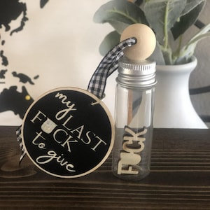 May include: A set of three ceramic mugs with a speckled, matte finish. Each mug features a different color: light blue, cream, and gray. The mugs have a simple, modern design, perfect for coffee or tea.