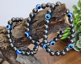 Evil Eye Hematite Bracelet: 8MM Tera Hertz Beads with Blue & Black Protection Charms