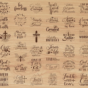 May include: A collection of 39 inspirational designs with religious quotes in various fonts. Phrases include "Always be joyful," "Walk by faith," and "God is good all the time." The designs are dark brown on a light brown wooden background.